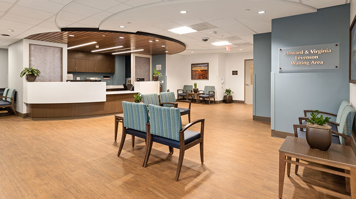 Nurses station and treatment waiting area located in radiation therapy suite